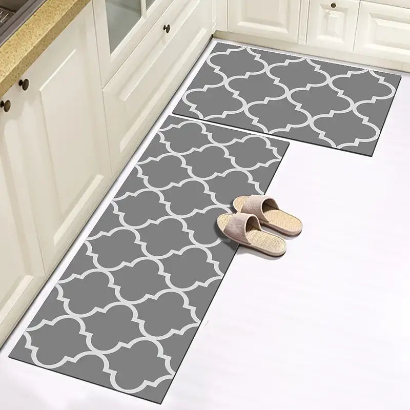 2pcs Non-slip Geometric Gray Kitchen Rugs (Various Sizes) placed in a kitchen, enhancing style and safety.